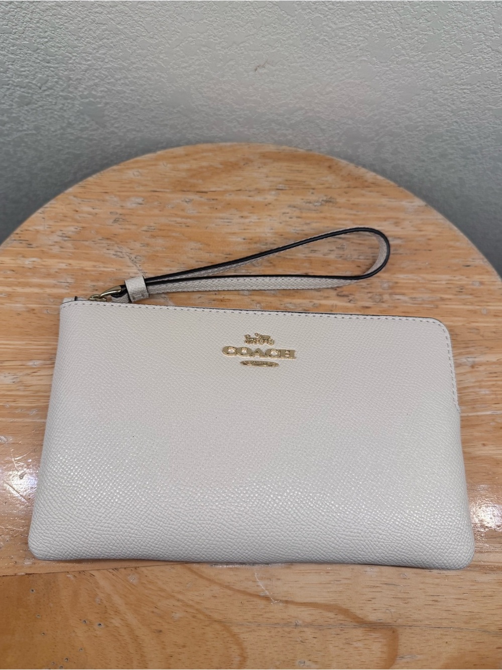 Coach Gold-Logo Pebbled Leather Wristlet in Light Cream IM/CHALK